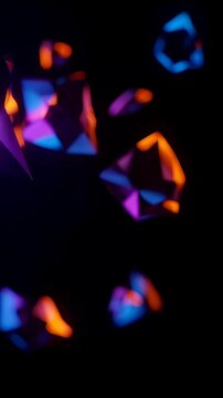 Abstract background with glowing geometric shapes. Purple and blue illuminated polygon form. Dark energy motion for visual effect. Vertical video