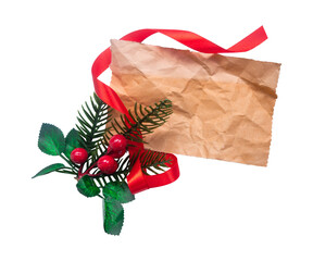 old christmas card with red ribbon and holly isolated on white background