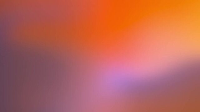 Vibrant abstract background with warm hues reminiscent of a painter's brush strokes and a colorful gradient effect