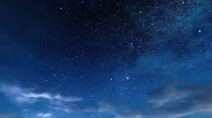 Obraz premium Vast Night Sky Filled With Stars and Clouds Under a Deep Blue Atmosphere