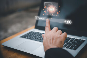Obraz premium Close-up of businessman using laptop with floating AI command prompt and icons, representing artificial intelligence, prompt engineering, generative technology for digital transformation.