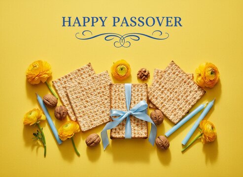 Happy Passover flat lay greeting with matzah, walnuts, and yellow flowers on a vibrant yellow background