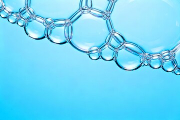 Soap bubbles on blue background