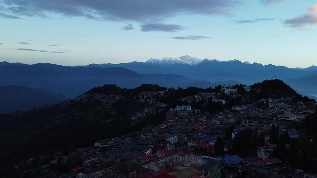 Kanchenjunga mountain is visible at the end of the hill.