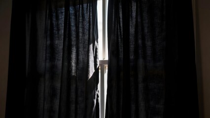 WindowWithDarkCurtains