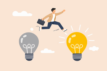 Man Jumping Over Light Bulbs