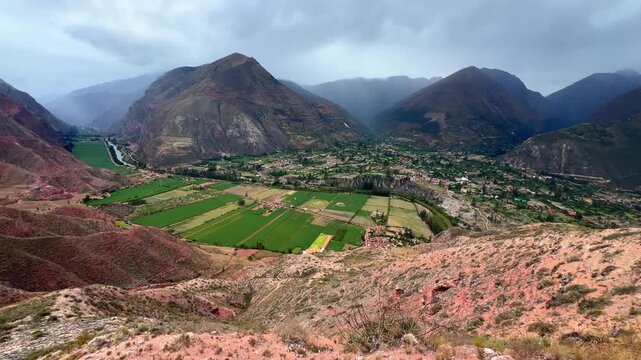 The Sacred Valley scenic landscape view Ollantaytambo Ancopacha Urubamba River Valley Peruvian Andres rainy season cloudy afternoon Cusco Peru High Plateau mountainside Quelccaya Glacier Inca Trail