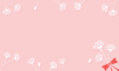 リボンで結ばれたカーネーションの花とカーネーションが飾られたピンクの立体的なフレーム