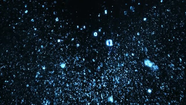 Digital lock glowing in blue pixels breaks into sparkling particles. Abstract slow motion cinematic animation of security dissolving. Technology concept for data protection visualization