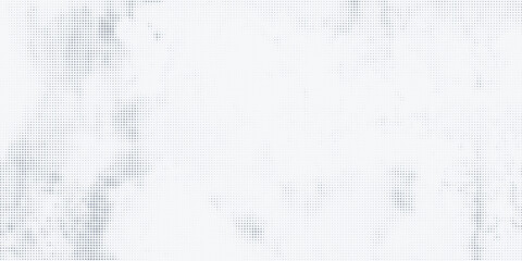 Soft abstract halftone background featuring small blue-gray dots on a light surface.