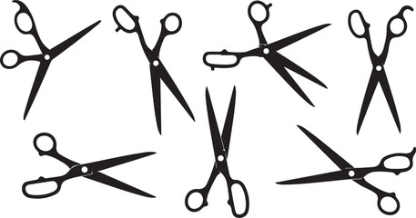 Collection of various black scissors on white background