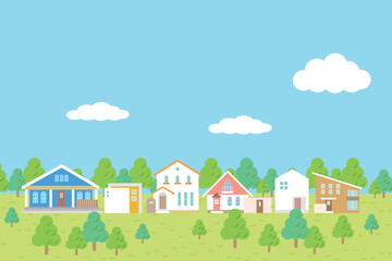 洋風のおしゃれな家が建ち並ぶ風景と爽やかな青空