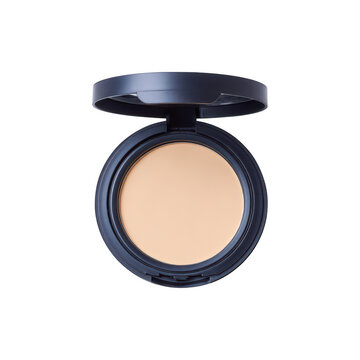 Open compact case with light shade cream foundation and mirror, isolated on a black background