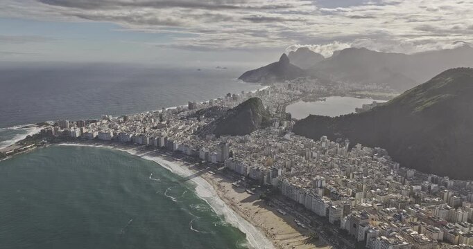 Rio de Janeiro Brazil Aerial v22 high altitude flyover the shoreline capturing the iconic Copacabana Beach, cityscape and mountain landscape at daytime - Shot with Mavic 3 Pro Cine - Mar 25th 2024