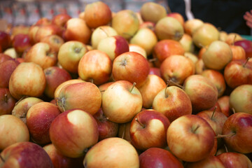 heap of ripe red apples as background