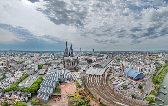 Panorama View of Hohenzollern Bridge, Cathedral in Cologne City, Germany. Drone