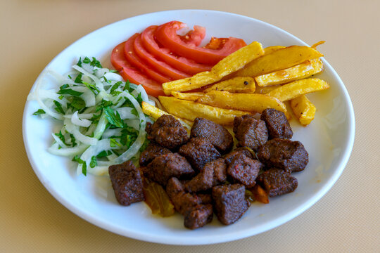 Dana kavurma, guvec.Sauteed meat with carrots and peas ( Turkish ; Et, Tavuk Sote. guvec  ) Et kavurma, orman ciftlik kebap. Tandir, tas kebabi.