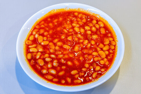 Turkish Etli Kuru Fasulye food with Traditional Turkish table with decoration. Nohut yemegi. Pilav ustu, kuru fasulye, nohut. Gunun menusu. Etli nohut yemegi.