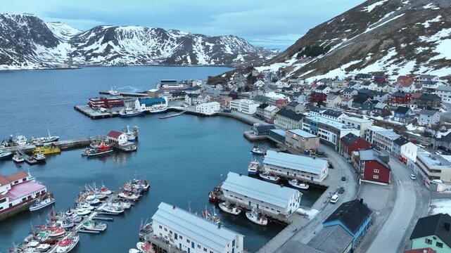 Arctic Honningsvag City townscape with snowy mountain and Barents Sea 4k