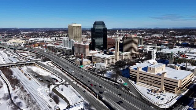 Aerial panoramic establishing downtown Springfield Massachusetts and I-91 highway