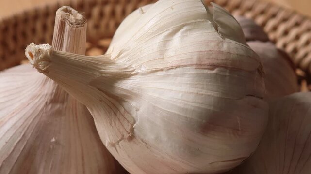 Fresh garlic in a basket.