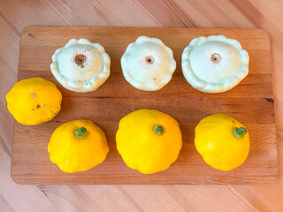 Pattypan Squashes on a Wooden Board