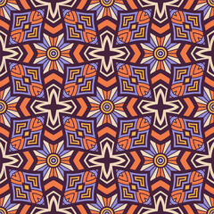 Seamless geometric ethnic vector pattern with symmetrical mandala elements, bold orange and purple colors, ornamental kaleidoscope design. Color vector seamless background.