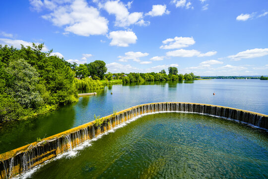 View of the dam at Lake Lippe and the surrounding landscape. Nature by the lake near Paderborn.
