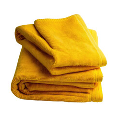 Stack of folded yellow towels, isolated on black
