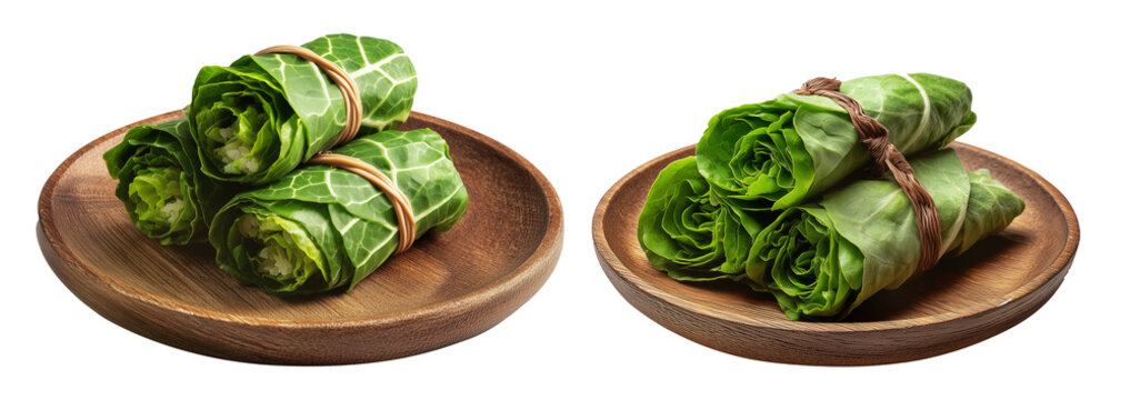 Set of Lu Pulu beef wraps filled with coconut cream in taro leaves on wooden plate, isolated on white transparent background