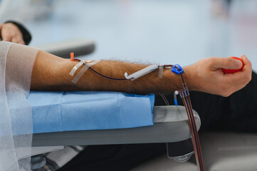 Blood donor participating in a blood donation process