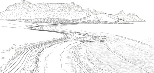 Winding coastal road curves by ocean with city and mountains in background