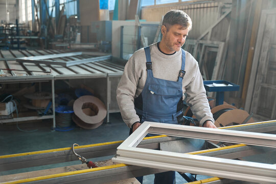 PVC windows manufacturing at industrial factory