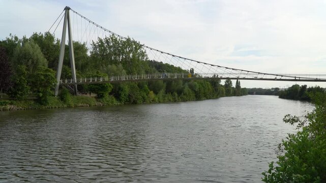 A pedestrian bridge crosses Oise river near Creil, northern France.