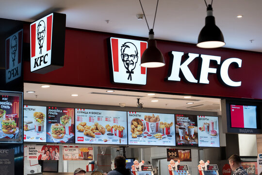 Inside KFC fast food restaurant. Show menu for customer. KFC is a fast food restaurant chain that specializes in fried chicken. Minsk, Belarus - March 4, 2025
