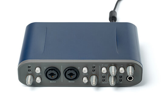 External professional audio interface for music recording and sound production isolated on white background
