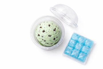 Mint chocolate chip ice cream scoop in clear dessert cup with lid open and frost crystals grab and go packshot high key studio isolated on white