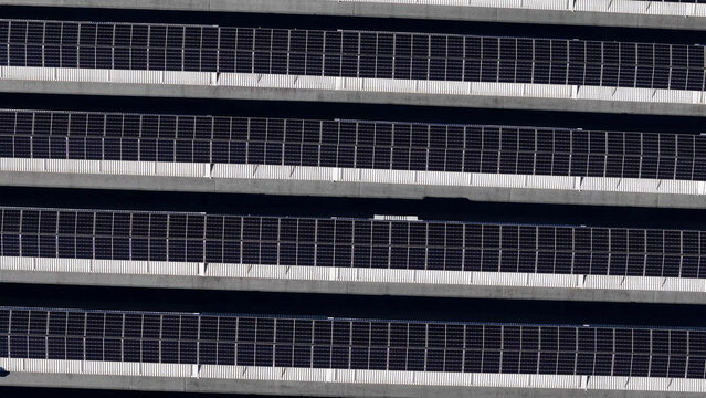 Rows of solar panels on a rooftop, generating clean energy from sunlight