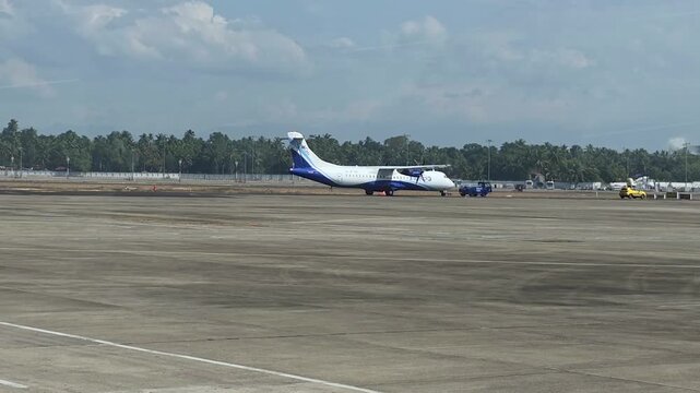 Airplane on runway at Munnar airport in Kerala