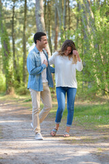 a romantic couple in the forest