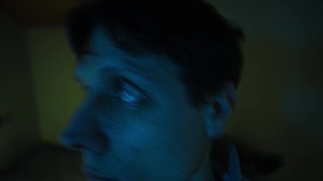 Fear and panic during drug intoxication at home, close-up portrait of man experiencing overdose anxiety, loss of control and psychological breakdown under influence of narcotics