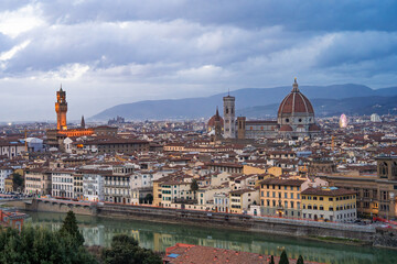 Obraz premium Panoramic view of historic Florence at sunset from Piazzale Michelangelo, capturing the city's golden hour beauty. Florence,Italy 03.01.2026 