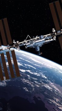 Vertical 3D animation of the space station in Earth orbit with a commercial spacecraft