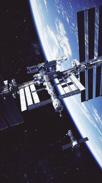 Vertical 3D animation of a spacecraft docking with a space station in Earth orbit.