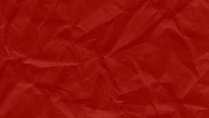 Obraz premium The red paper background is crumpled, the surface is old and creased.