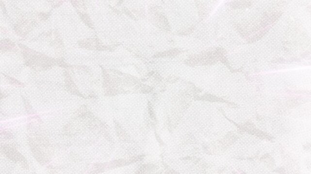 The background features a crumpled, wrinkled white paper texture. There are subtle light effects and tiny dots distributed across the surface to create depth.
