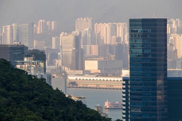 High density residential towers in Hong Kong with harbor foreground © Thomas