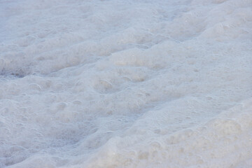 Soft white foam surface textured background