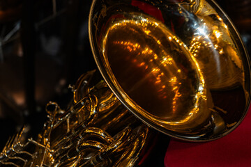 Detailed Close-Up of Shiny Golden Brass Tuba Valves and Pipes
