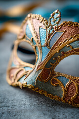 A gold and blue mask